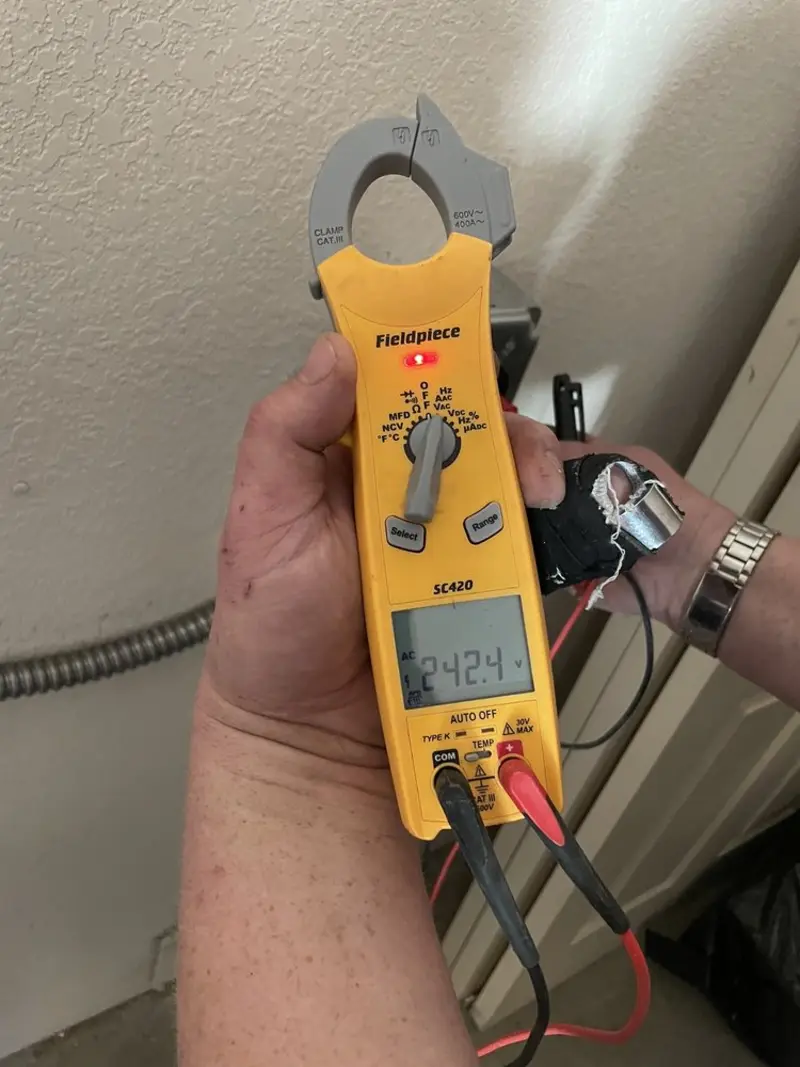 Voltage testing with clamp meter during Circuit Breaker Repair in Lawrenceburg